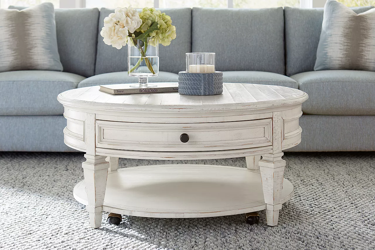 The Beckley round coffee table in Alabaster in room scene.